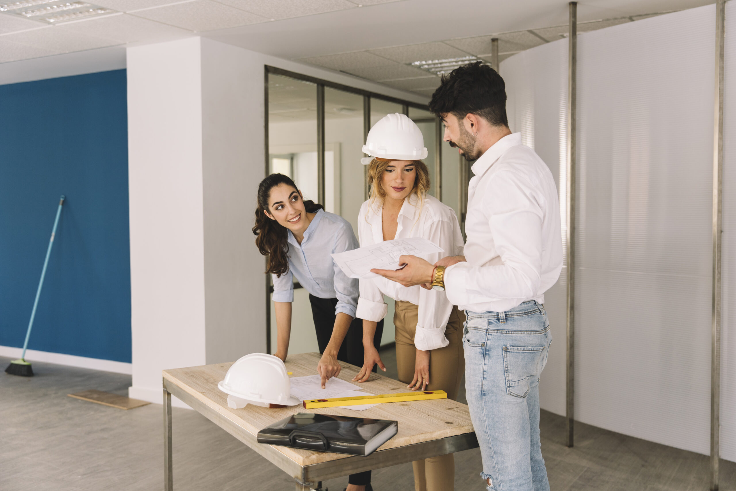 engineering concept with three business people scaled